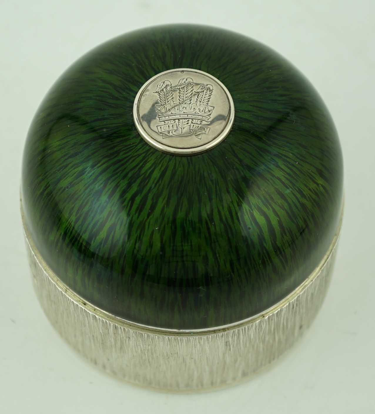 An Elizabeth II textured silver and green enamelled circular box and cover by Adrian Gerald Benney